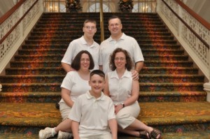 A-family-pose-on-the-massive-staircase