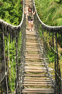 my daughter crossing one of the two suspension bridges