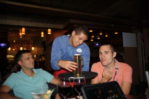Giovani bringing my frosty beer!