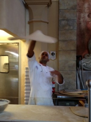 Kids will love observing the pizza throwing.