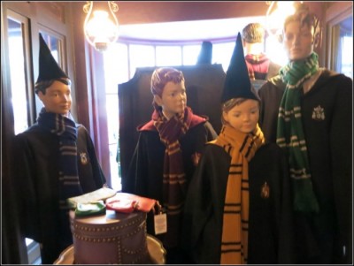 Young wizards model their school robes and scarves