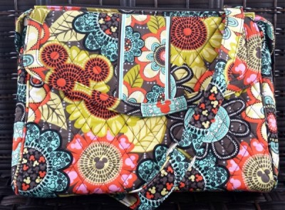 An iPad or small tablet will fit well in the Perfect Petals tablet hipster bag