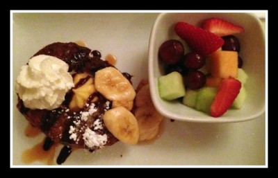 Croissant Donut served with fresh fruit