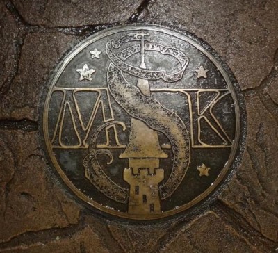 This large plate on the ground is effectively the X that marks the spot. Stand here when playing the game.