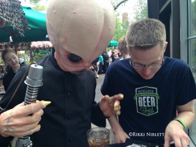 Cantina Band Member Helping Pick Dinner Options