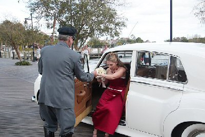 Eliza exits the limo