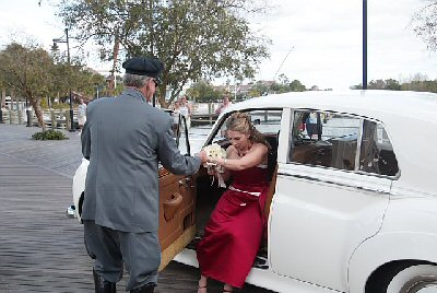 Eliza exits the limo