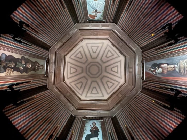 An image looking up  in the stretch room at the Haunted Mansion.
