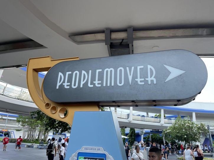 Sign for the Tomorrowland Transit Authority PeopleMover, done in a futuristic style.