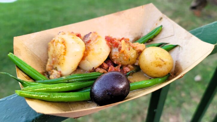 You can redeem snack credits for Epcot Food and Wine booth items